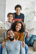 © Lumos sp - child family mother portrait father woman happy daughter son man girl female black american african  love together boy fun parent teen teenager