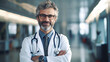 © tong2530 - Portrait of A smiling doctor standing with arms crossed in hospital corridor. Generative Ai