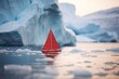 © urdialex - sailboat sailing in the arctic sea between icebergs in Antarctica