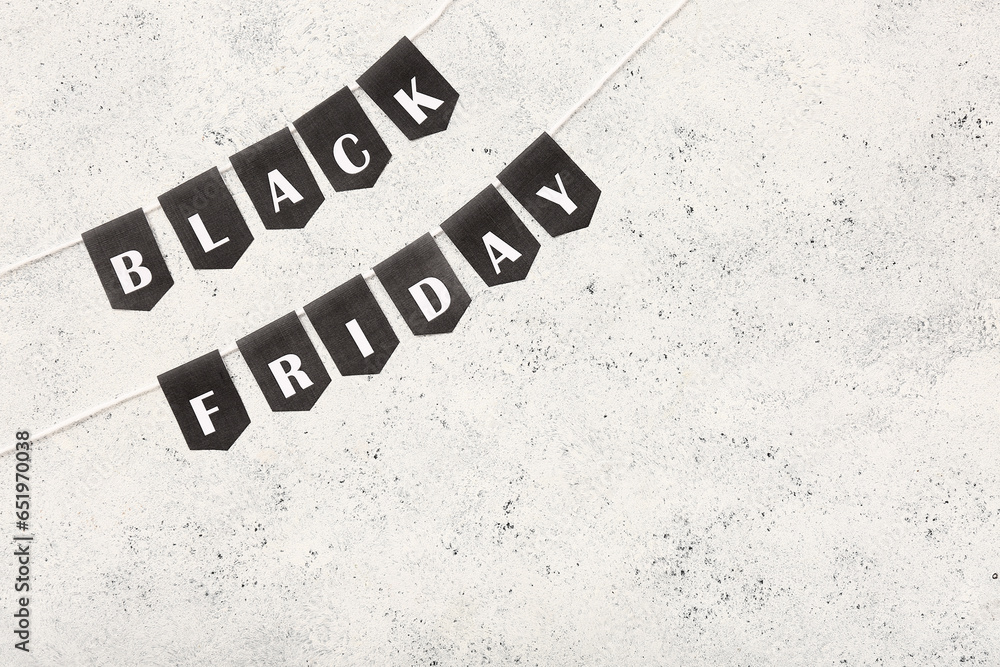 Rope and flags with text BLACK FRIDAY on white background