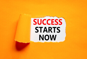 Success starts now symbol. Concept word Success starts now on beautiful white paper. Beautiful orange table orange background. Business motivational success starts now concept. Copy space.