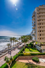 Wall Mural - Marbella, Spain - April 5, 2023: Aerial view of the promenade along the ocean