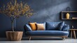 Loft home interior design of a modern living room with a dark blue sofa and round wooden coffee table against a concrete wall with painted tree branches