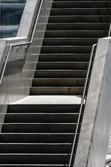 Sticker - Tall concrete stairs in sunshine.