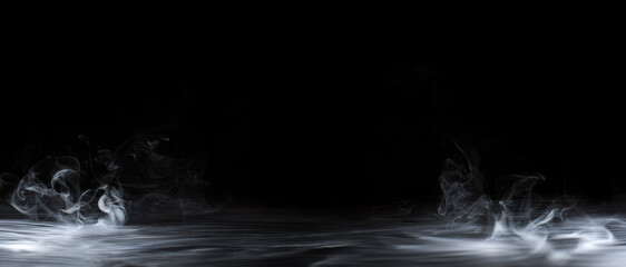 Wall Mural - real smoke blanketing the floor and swirling upwards. dramatic smoke or fog effect for spooky hallow
