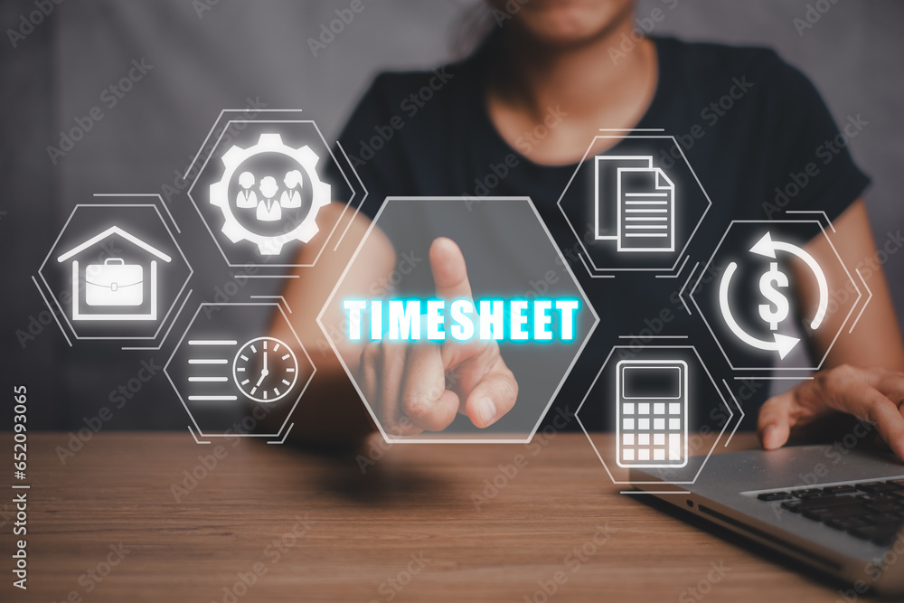 Timesheet concept, Business woman working on laptop computer and hand ...