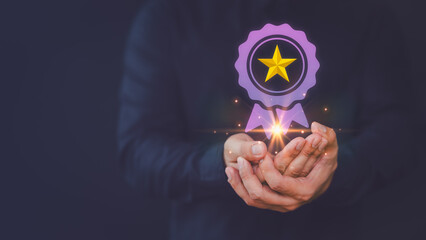 Poster - Assessment quality assurance of business services, guarantee, warranty, standard, certification, testimonial concept. Businessman hand show the best quality assurance with golden star warranty icon.
