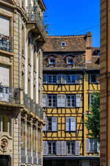 Wall Mural - Ornate traditional half timbered houses in the old town of Grande Ile, the historic center of Strasbourg, Alsace, France