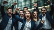 © visoot - Business win, Corporate success, Business team employees celebrating good news with their fists up in the air.