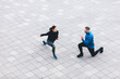© Photocreo Bednarek - Couple do fitness workout and stretching in ubran city area