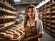 Young woman baker, small business owner staying in her bakery, successful entrepreneur, copyspace.