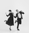 © master1305 - Rhythmic. Black and white. Stylish, elegant young couple, man and woman in stylus clothes dancing. Concept of hobby, retro dance, vintage style, choreography, beauty. Monochrome art. Ad