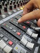 © r4cproject - using button on sound mixer panel to mute channel