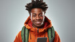 © LomaPari2021 - cheerful adult african male teenager backpack casual cloth ready to school concept.generative ai