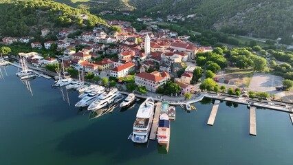 Sticker - Drone view over white boats parked on a coast of an island