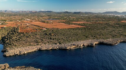 Canvas Print - Drone shot of a stunning nature landscape between Sa Coma and Porto Cristo in Mallorca, Spain