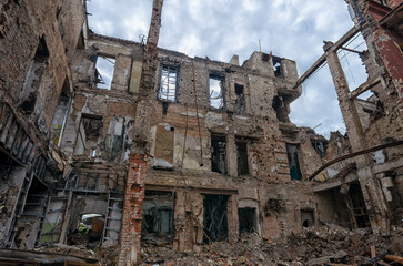 Wall Mural - destroyed and burned houses in the city during the war in Ukraine