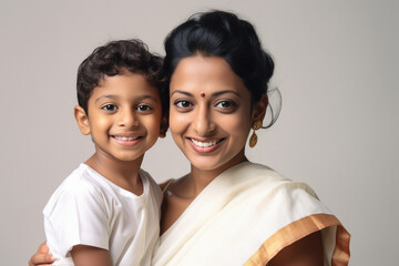 Indian mother with her little boy smiling