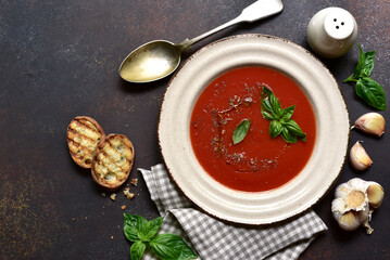 Wall Mural - Spicy tomato soup or gazpacho. Top view with copy space.