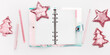 © yrabota - Open blank copybook, woman diary with colored gradient cover, Christmas decoration fir tree and star from sequins on white, banner. Concept of planning future goals and ideas for New Year