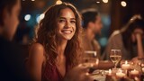 Fototapeta  - Beautiful woman enjoying while having dinner with friends at night party.
