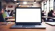© Аrtranq - mockup image of laptop with blank transparent screen, on the table by the notebooks and students in a cozy school classroom environment furnishings. Ideal for educational school and university website