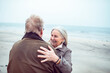 © Marko Geber - Senior Caucasian couple dancing together on the beach
