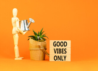 Wall Mural - Good vibes only symbol. Concept word Good vibes only on beautiful wooden block. Businessman model. Beautiful orange table orange background. Business motivational good vibes only concept. Copy space.