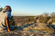 © PhotoJoeSTL - photographer in the mountains looking over the horizon