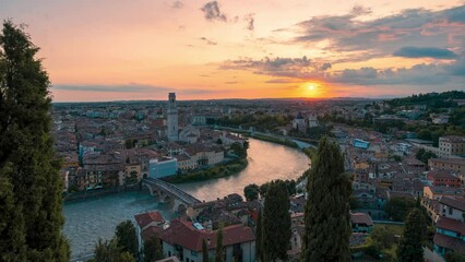 Wall Mural - Time lapse of beautiful sunset in the city of Verona, Italy, with view over the Adige river