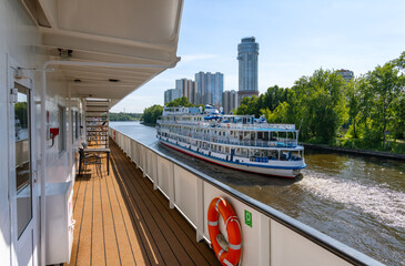 Wall Mural - Cruise river steamers sail along the Moscow Canal