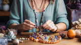 Beading workplace, female hands in process of handicraft. Beautiful diy jewelry hobby, designer handmade jewelry exclusive. 