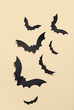 © Pixel-Shot - Paper bats for Halloween party on yellow background