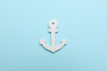 Poster - Anchor figure on pale blue background, top view