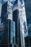 Fototapeta Miasta - Modern High rise glass building
