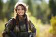  portrait of positive caucasian soldier woman smiling at camera in nature posing war hunting military concept 