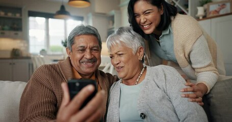 Canvas Print - Video call, living room and woman with elderly parents on a sofa relaxing and talking on a phone. Smile, bonding and female person with senior people on virtual conversation with cellphone at home.