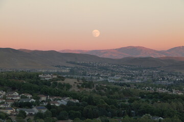 Wall Mural - The August Supermoon rises over the East Bay hills near San Ramon, California