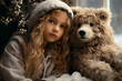 © fadi - girl with a toy,  girl and a teddy bear sits in front of the window in her room and watches outside , snowy cozy weather
