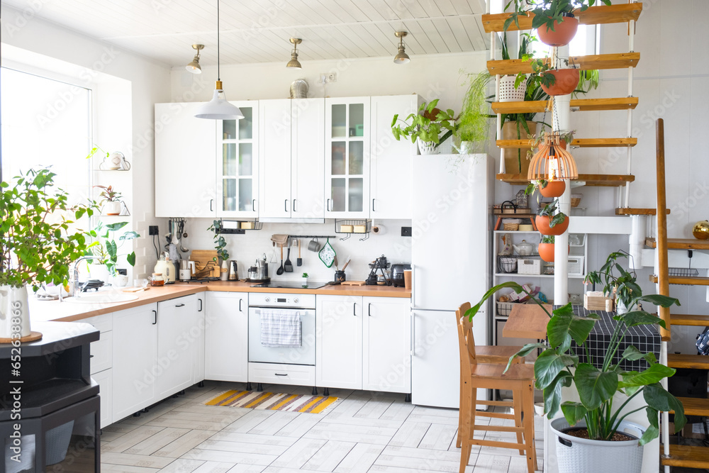 The general plan of a light white modern rustic kitchen with a modular ...