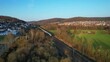 Aerial drone view of  Intercity Express , commonly known as ICE train  in Hesse, Germany