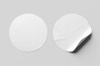 peeled and crumpled round circular adhesive sticker label tag badge realistic mockup template top view 3d rendering illustration