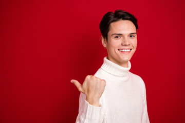 Canvas Print - Closeup portrait of smiling brunet hair entrepreneur wear white jumper finger direct mockup good xmas promo isolated on red color background