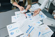 © Jirapong - startup Asian business advisor meeting to analyze and discuss the situation on the financial report in the meeting room.Investment Consultant, Financial , teamwork ,brainstorming and accounting