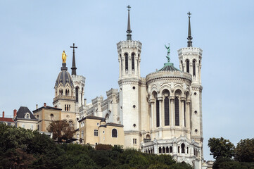 Poster - Basilica of Notre-Dame de Fourviere and tower of Chapelle Saint Thomas - Sainte Marie in Lyon city, France