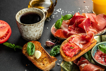 Wall Mural - Traditional Spanish breakfast. Tostada with Jamon Iberico ham and tomatoes, olive oil bread with coffee. banner, menu, recipe place for text, top view