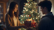 couple in love giving each other gifts at christmas