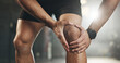 Fitness, knee pain and hands of man at gym for training with muscle, problem or arthritis. Sports, injury and leg of male athlete with joint massage for fibromyalgia, osteoporosis or bone accident