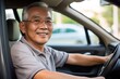 © Dangubic - Happy Senior Southeast Asian Man Driving a Car. Generative AI