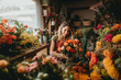 © Jasmina - Smiling woman florist arranging a beautiful bouquet of flowers in a flower shop